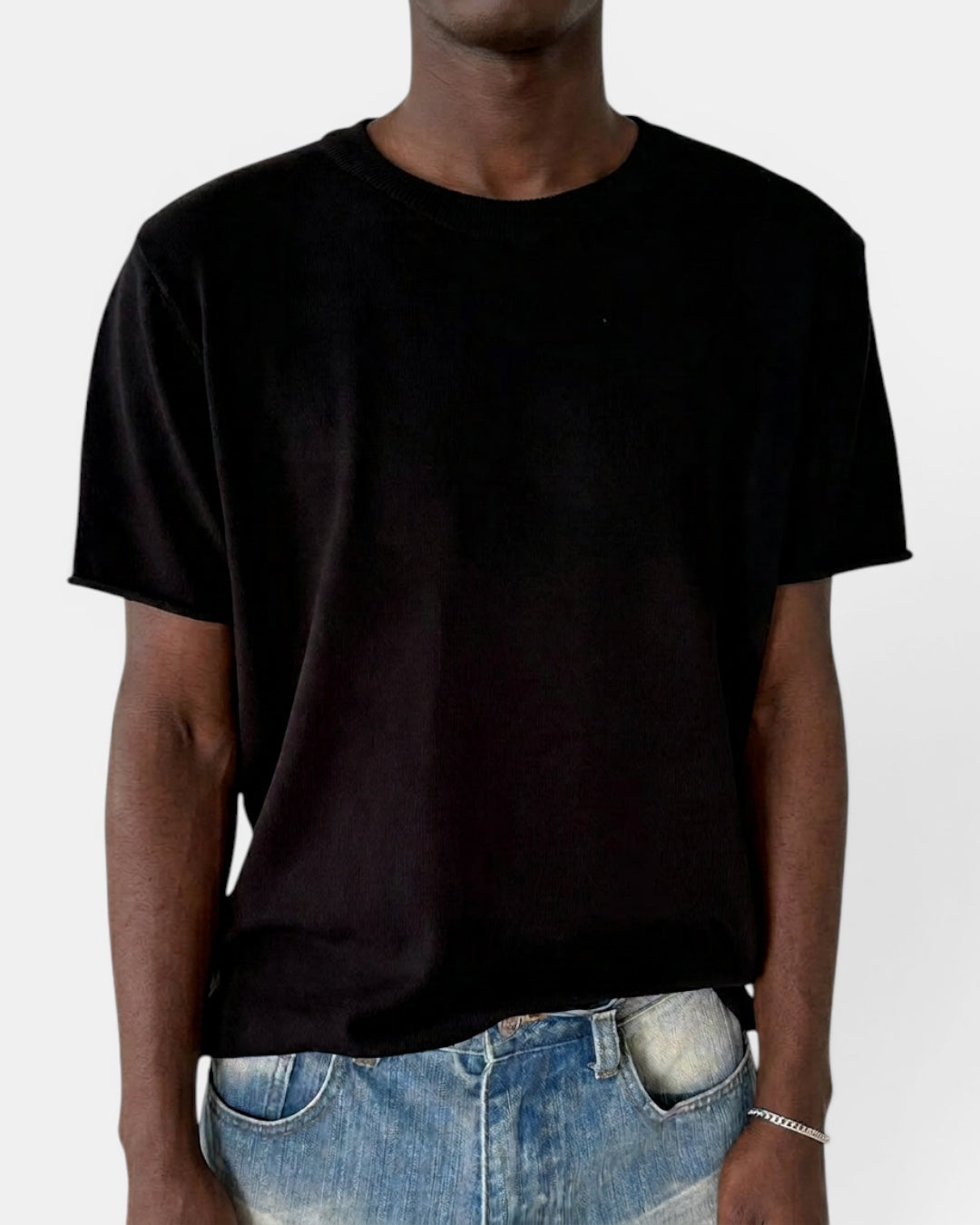 NAMELESS black short-sleeve knit top with cuffed sleeves and a relaxed fit, made from a cotton-nylon blend.